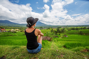 woman looking at rice terrace in Bali, Indonesia