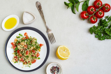 Lebanese traditional salad taboule soaked bulgur and ingredients