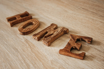 Wooden word HOME.