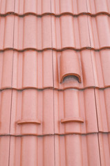 New roof with ceramic tiles and ventilating tile