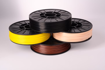Filament for 3D Printer crystal clear and bright against a bright background.