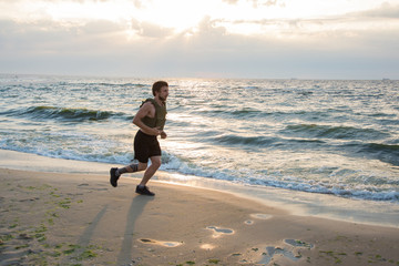 Young bearded athlete training outdoor with weighted vest,  exercise with military plate carrier