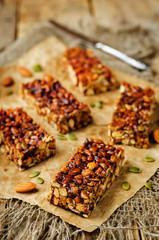 Honey nuts bars with glasses of milk