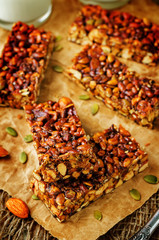 Honey nuts bars with glasses of milk