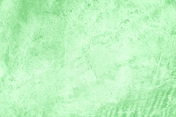 Green neo mint color background. Concrete or beton pattern