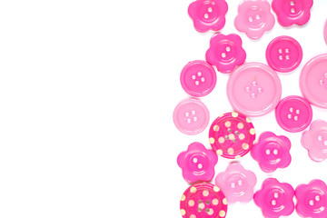 Various pink sewing buttons isolated on white background