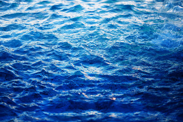 Obraz premium Macro photo background with transparent blue waves of sea