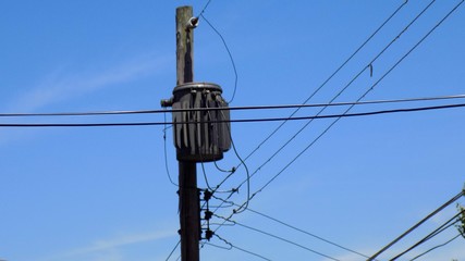 old wooden pole and wires
