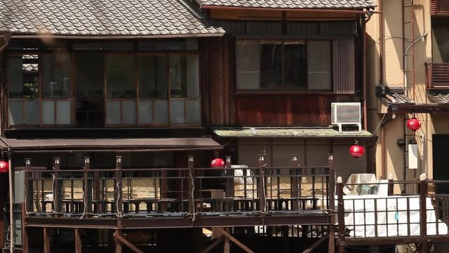 Kyoto Kamo-Gawa river banks wooden houses