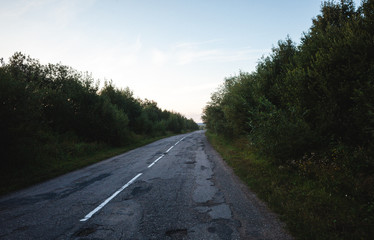 Pothole in pavement signifying failing infrastructure