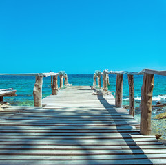 Old, wooden mole on a tropical, asian beach