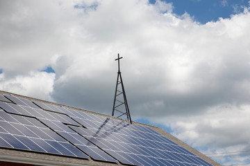 Solar panels and cross on roof