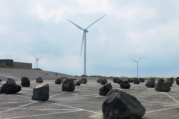 wind turbines at sunset