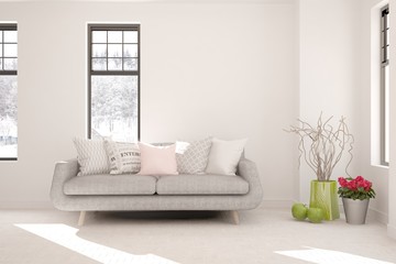 Stylish room in white color with sofa and winter landscape in window. Scandinavian interior design. 3D illustration