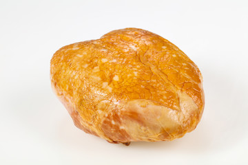 Smoked chicken breast over white background