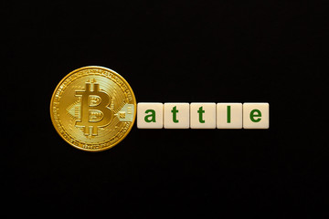 Word Battle made up of cubes. The first letter of the word is symbolized by a bitcoin coin. Concept...