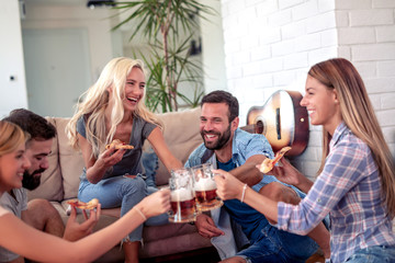 Fototapeta premium Group of friends enjoying together at home