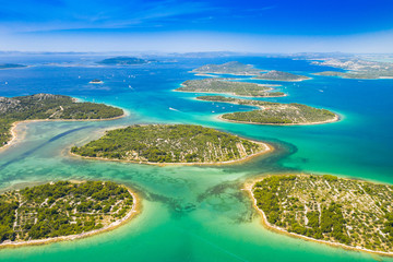 Croatian coast, beautiful small Mediterranean stone islands in Murter archipelago coastline, aerial view of turquoise bays with yachts and boats