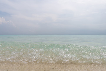 Wave close up. Pure turquoise water. White sand.
