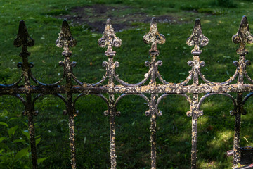 Fototapeta premium Husby, Sweden A moss covered entry gate to a cemetary.