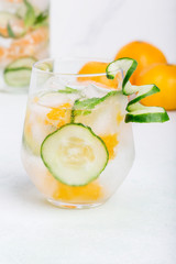 Fresh cocktail with mandarin and cucumber