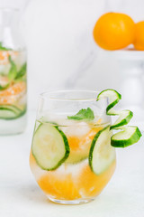 Fresh lemonade with mandarin and cucumber