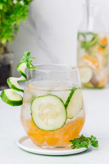 Fresh lemonade with mandarin and cucumber