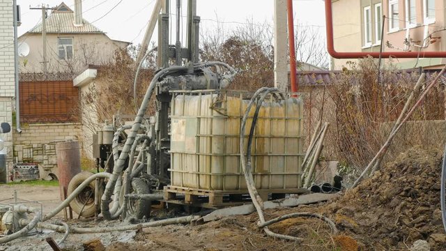 modified forklift into the device to create wells
