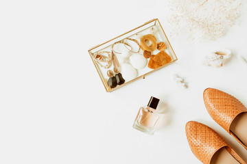 Feminine fashion composition with stylish accessories: leather shoes, earrings, perfume, flower...