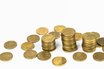 stacks of euro coins isolated on white backdrop