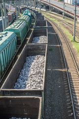 Fototapeta premium Transportation of rubble, stones in railway cars.