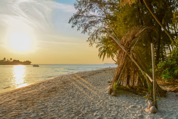 Amazing sunset on exotic beach. Koh Kood island, Thailand.