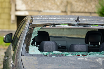 Hail damage to rear window after a thunderstorm