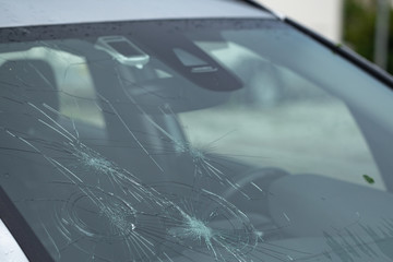 Hail damage to frnt window after a thunderstorm