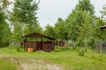 Holiday house near the lake. The concept of fishing and recreation