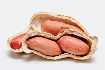 Large peeled peanuts close-up of beans in the shell. Unpeeled peanuts in the shell. Peanuts, for...