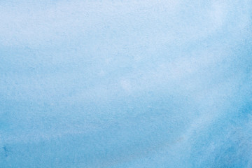 blue watercolor background, sheet of paper covered with paint with texture