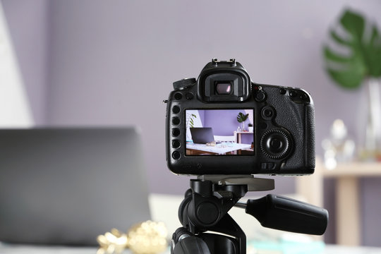 Photo of blogger's workplace on camera screen, closeup with space for text