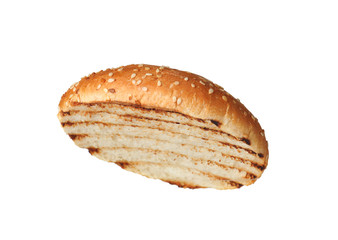 Half of grilled burger bun isolated on white