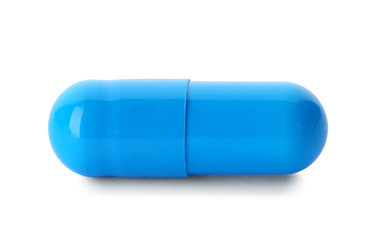 Color pill isolated on white. Medical treatment