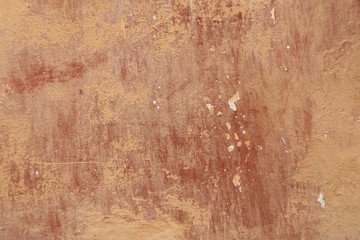 old plastered wall with battered paint