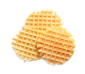 Delicious waffles for breakfast on white background, top view