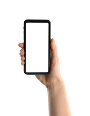 Woman holding smartphone with blank screen on white background, closeup of hand. Space for text