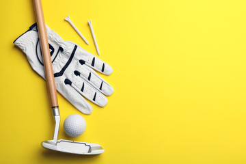 Set of golf equipment on color background, flat lay. Space for text