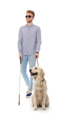 Blind person with long cane and guide dog on white background