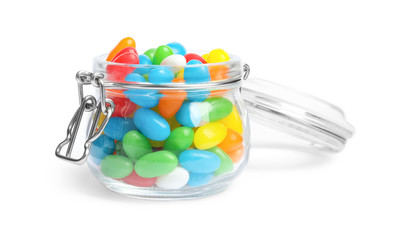 Jar of delicious color jelly beans isolated on white
