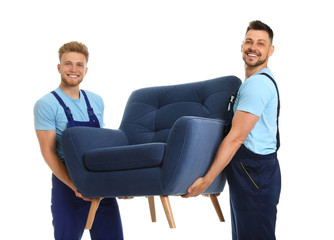 Obraz premium Portrait of moving service employees with armchair on white background