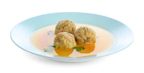 Dish of Jewish matzoh balls soup isolated on white