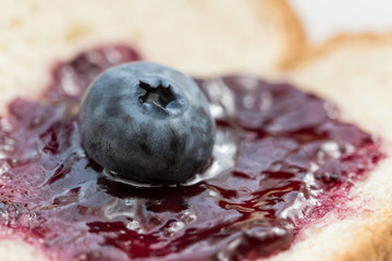 Fresh blueberries, blueberry juice, blueberry jam and bread