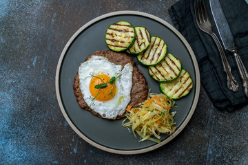 beef steak with egg and zuccini